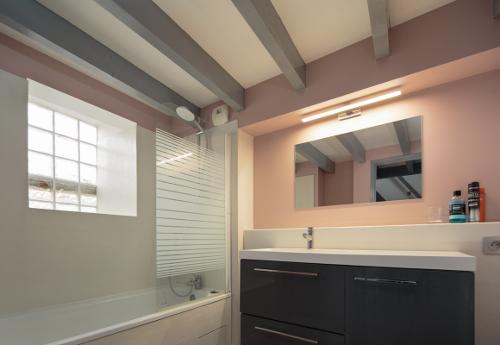 Bathroom with shower over bath